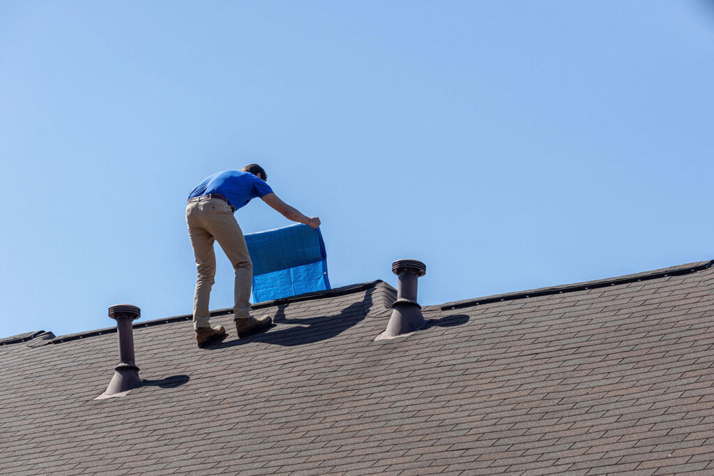 Hancock employee during a roof inspection process
